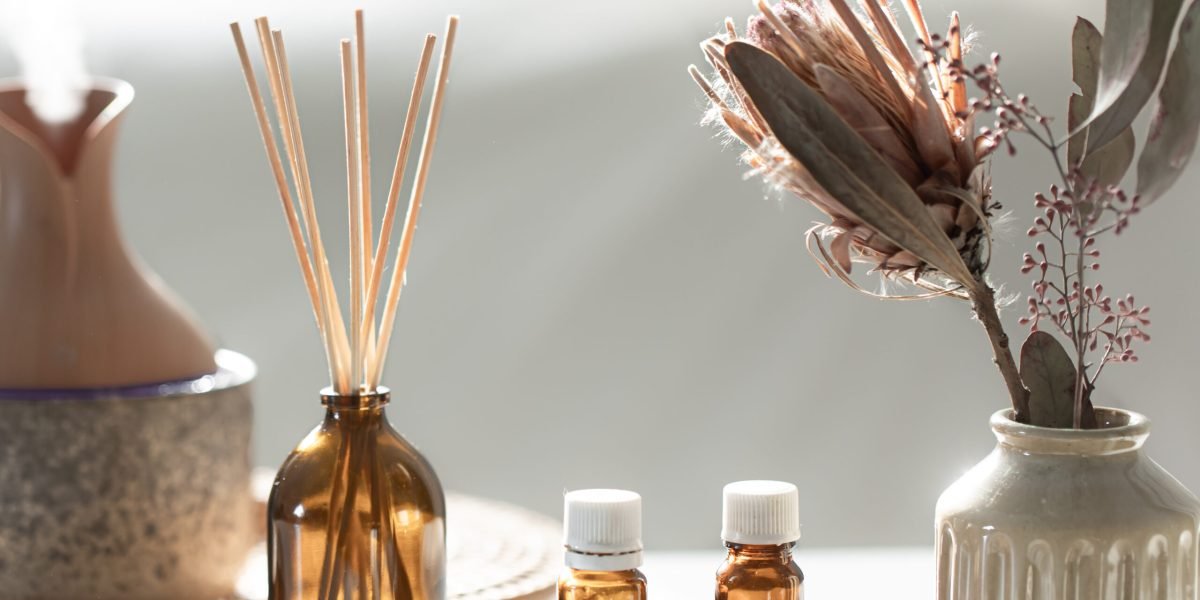 Spa composition with incense sticks, air humidifier and aroma oils. Aroma oil diffuser lamp with the stick perfume.