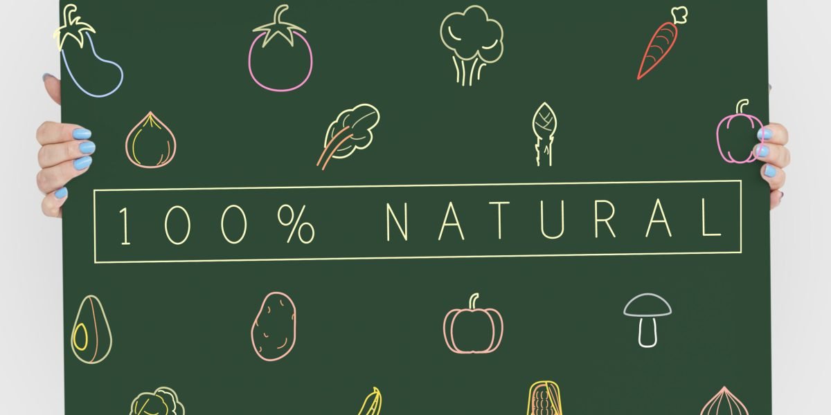 People holding a board about healthy nutrition Veggie